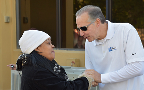 Attorney shaking hands with a woman